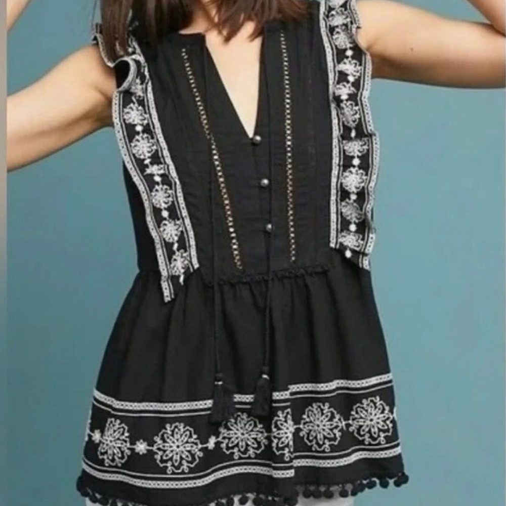 Anthropologie Akemi + Kin Adelina Embroidered Tasseled Pom Pom Hem Ruffle Top